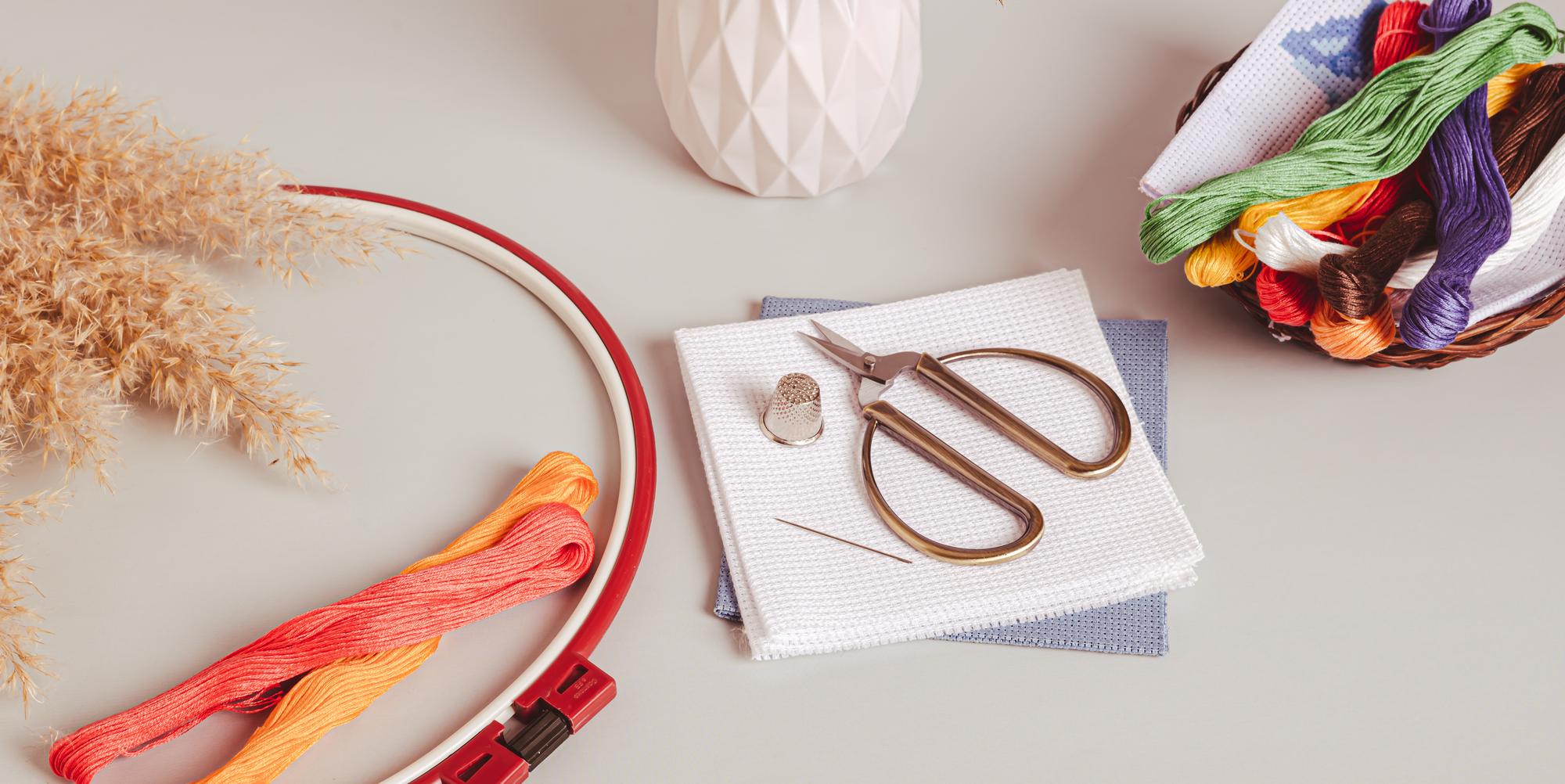 Studio workspace with threads and hoops